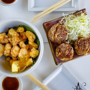 Ramenya - Fried tentacles and pork shumai. Tentacles were chewy and forgetful. The Shumai was an explosion of flavor! - Ramen Near Me - Los Angeles, California Ramenya - Fried tentacles and pork shumai. Tentacles were chewy and forgetful. The Shumai was an explosion of flavor! - Ramen Near Me - Los Angeles, California