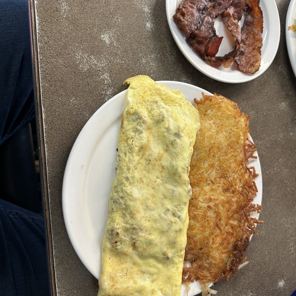 Huge portions! Meat and cheese omelette Huge portions! Meat and cheese omelette