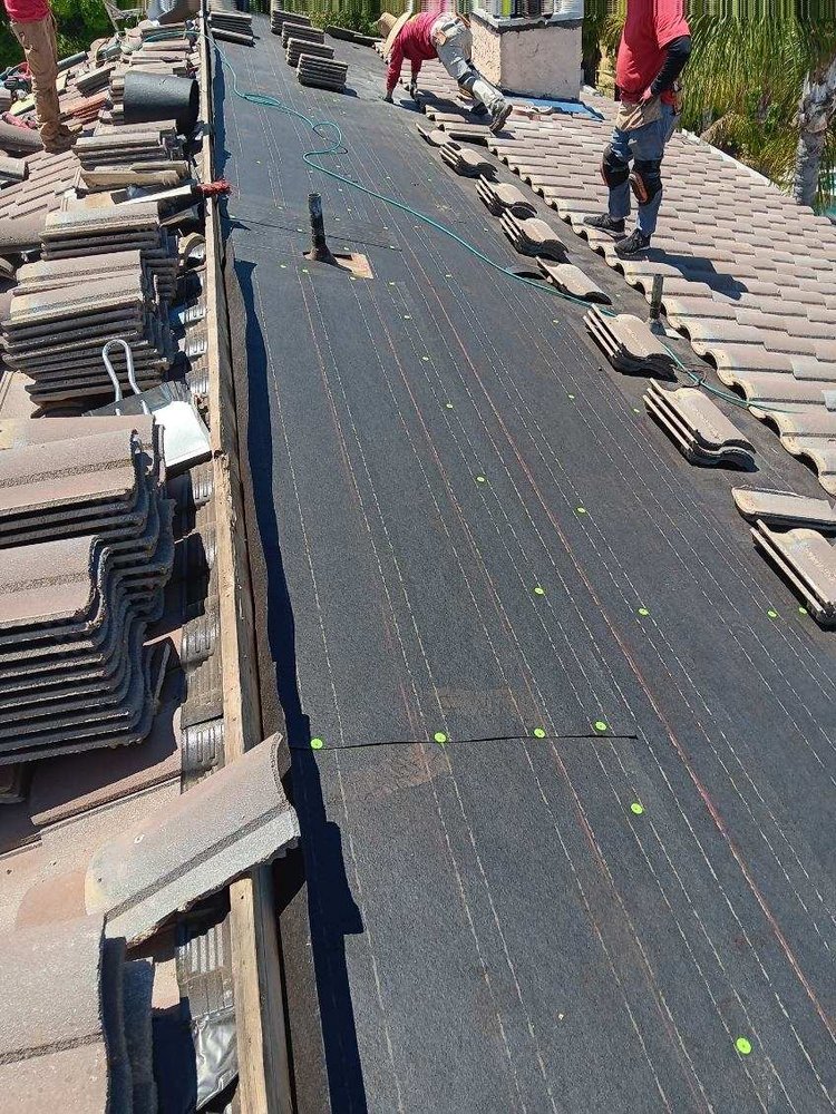 Slide of AVO Roofing Services