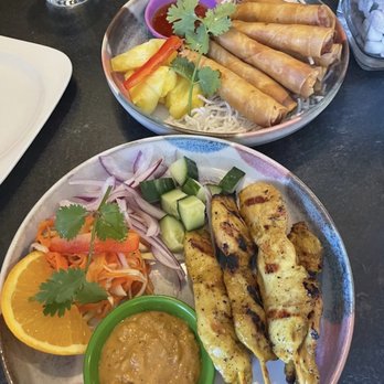 Nimman Thai Cuisine - Chicken skewers and spring rolls - Thai Near Me - Toronto, Ontario Nimman Thai Cuisine - Chicken skewers and spring rolls - Thai Near Me - Toronto, Ontario