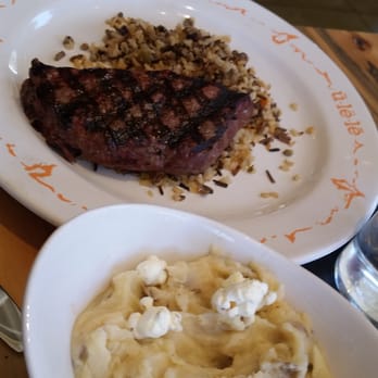 Ulele - Steak and mashed potatoes w popcorn served w wild rice - New American Near Me - Tampa, Florida Ulele - Steak and mashed potatoes w popcorn served w wild rice - New American Near Me - Tampa, Florida