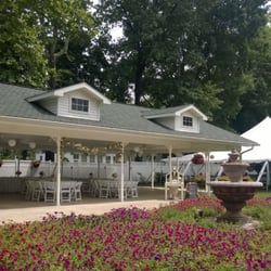 Greene Gables - Wedding reception under the pavilion with a tent set up.