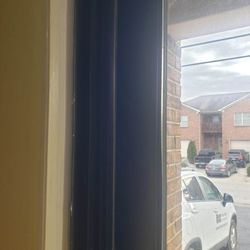 Quality Inn - The sliding glass door had a quarter inch opening