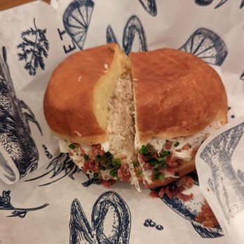 Market Seafood Eatery - Crab donut. Dipped with bacon bits - Seafood Near Me - Seattle, Washington Market Seafood Eatery - Crab donut. Dipped with bacon bits - Seafood Near Me - Seattle, Washington