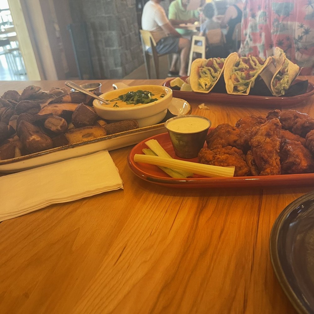 Pickle chips, boneless wings, pretzels and beer cheese dip and shrimp tacos. Pickle chips, boneless wings, pretzels and beer cheese dip and shrimp tacos.