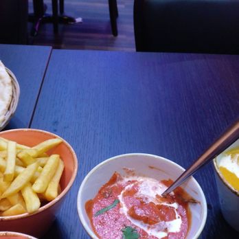 Roti - I loved the chicken korma, to the right. - Indian Near Me - Edinburgh, EDH Roti - I loved the chicken korma, to the right. - Indian Near Me - Edinburgh, EDH