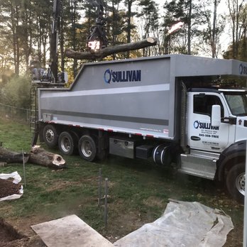 O'Sullivan Tree Care - Truck lifting logs - Tree Services Near Me - West Nyack, New York O'Sullivan Tree Care - Truck lifting logs - Tree Services Near Me - West Nyack, New York
