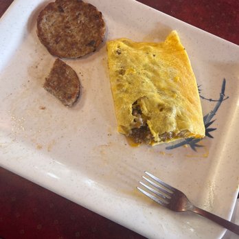 Port Cafe - Sausage and cheese omelet with a side of sausage.  This normally has hash browns and toast too but I had them hold them. - Breakfast & Brunch Near Me - Freeport, Texas