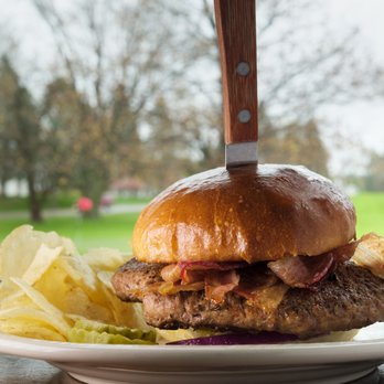 Knickers Restaurant & Pub - a burger with a knife stuck in it - Pubs Near Me - Manistee, Michigan Knickers Restaurant & Pub - a burger with a knife stuck in it - Pubs Near Me - Manistee, Michigan