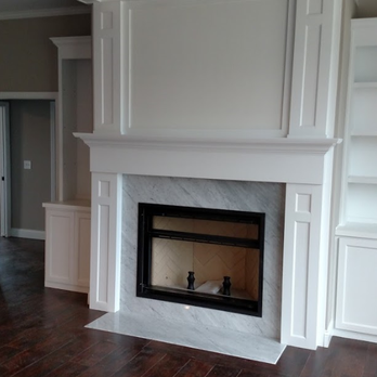 Mathers Construction - a fireplace in a living room - General Contractors Near Me - Hebron, Kentucky Mathers Construction - a fireplace in a living room - General Contractors Near Me - Hebron, Kentucky