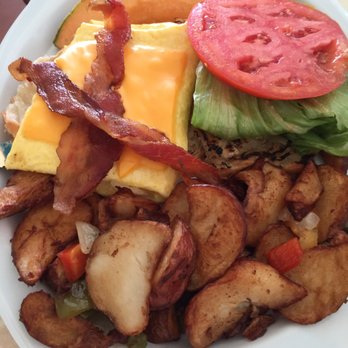 The Dune Deck Cafe - Breakfast croissant with bacon, cheese, lettuce and tomato. Tasty! - Breakfast & Brunch Near Me - Lantana, Florida The Dune Deck Cafe - Breakfast croissant with bacon, cheese, lettuce and tomato. Tasty! - Breakfast & Brunch Near Me - Lantana, Florida