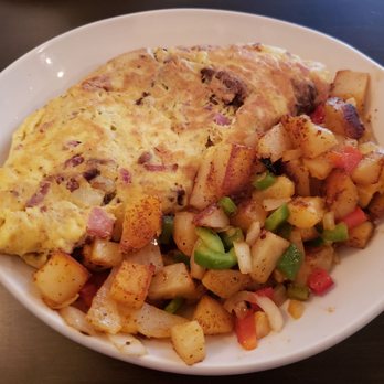 Orenda Cafe - Carnivore Omelette, hash potatoes and peppers - Breakfast & Brunch Near Me - Milwaukee, Wisconsin Orenda Cafe - Carnivore Omelette, hash potatoes and peppers - Breakfast & Brunch Near Me - Milwaukee, Wisconsin
