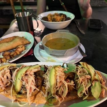 Waiter's Gastro Bar - Tostones topped with skirt steak, spicy crap and avocado. Also, skirt steak rice - Latin American Near Me - San Juan, Puerto Rico
