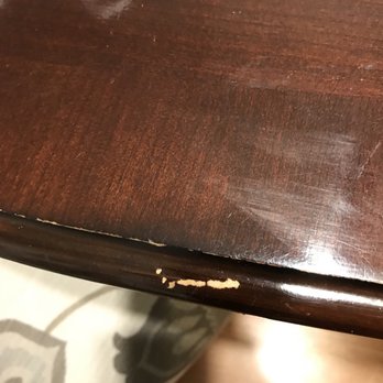 Universal Movers - Another gouge out of the dining table - Movers Near Me