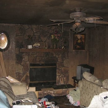 Alliance Disaster Kleenup - Fireplace and living room damage before restoration. - Damage Restoration Near Me - Wheeling, Illinois