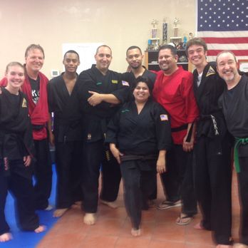 Desert Mountain Kenpo - The lady in the middle? Yeah- that's me. The guy in the red behind me? My husband. The people in this picture- my karate family - Kickboxing Near Me - Tucson, Arizona Desert Mountain Kenpo - The lady in the middle? Yeah- that's me. The guy in the red behind me? My husband. The people in this picture- my karate family - Kickboxing Near Me - Tucson, Arizona