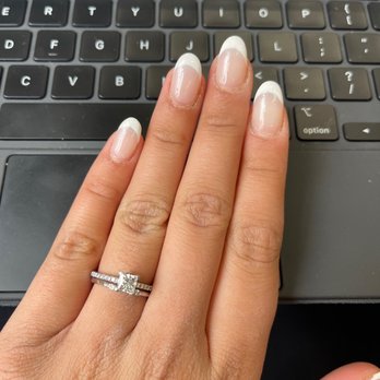 Gloss Nail Bar - Pretty nails but deeply cut cuticles and uneven French. - Nail Salons Near Me - Anaheim, California Gloss Nail Bar - Pretty nails but deeply cut cuticles and uneven French. - Nail Salons Near Me - Anaheim, California