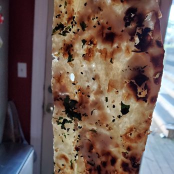 Indian Oven - Naan is so thin you can see through it. Floppy, oily. Can not use it to mop up the sauce. - Indian Near Me - Columbus, Ohio Indian Oven - Naan is so thin you can see through it. Floppy, oily. Can not use it to mop up the sauce. - Indian Near Me - Columbus, Ohio
