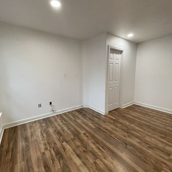 Dulles Handyman - Basement remodel wall and door added to divide wall he unit from the rest of house, floors, recessed light installed - Handyman Near Me