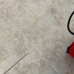 Roland Service Tile Carpet Cleaning - Before and After in one shot. Total area completed was 1,100 Sq Ft and it all looked like the after when completed.