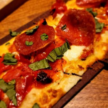 Seasons 52 - Close up of pepperoni flat bread - New American Near Me - Lone Tree, Colorado Seasons 52 - Close up of pepperoni flat bread - New American Near Me - Lone Tree, Colorado