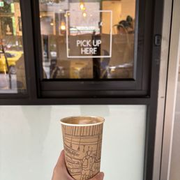 Exterior outside entrance of Breka Bakery & Cafe - Medium latte - Vancouver, British Columbia Exterior outside entrance of Breka Bakery & Cafe - Medium latte - Vancouver, British Columbia