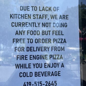 T&j's Smokehouse - a sign in a window - Smokehouse Near Me - Put-in-Bay, Ohio T&j's Smokehouse - a sign in a window - Smokehouse Near Me - Put-in-Bay, Ohio