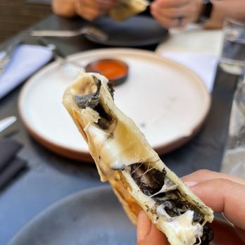 Comedor - Wild mushroom quesadilla with Oaxaca cheese - Mexican Near Me - Austin, Texas Comedor - Wild mushroom quesadilla with Oaxaca cheese - Mexican Near Me - Austin, Texas