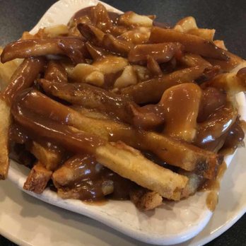 Maple Leaf Diner - Half order of the classic poutine - American Near Me - Dallas, Texas Maple Leaf Diner - Half order of the classic poutine - American Near Me - Dallas, Texas