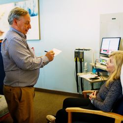 LaserTech Pain and Back Relief Center - Dr. Z consulting with neuropathy treatment patient