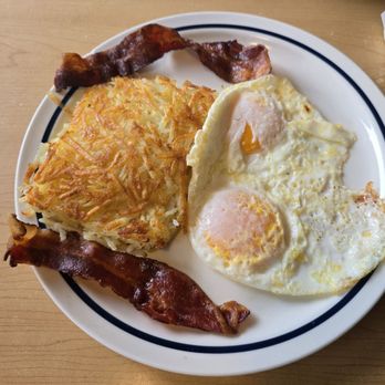 IHOP - Rise and Shine breakfast with eggs over easy, sausage, and hash browns. - Breakfast & Brunch Near Me - Mchenry, Illinois IHOP - Rise and Shine breakfast with eggs over easy, sausage, and hash browns. - Breakfast & Brunch Near Me - Mchenry, Illinois