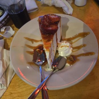 Logan's Roadhouse - Strawberry and caramel drizzled cheesecake - Steakhouses Near Me - Lufkin, Texas Logan's Roadhouse - Strawberry and caramel drizzled cheesecake - Steakhouses Near Me - Lufkin, Texas
