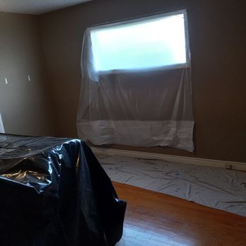 American Vision Windows - Bdrm 1 install.  They covered everything and cut from the outside to make the window bigger. - Windows Installation Near Me - Tustin, California
