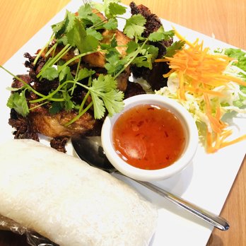 Thai Noon Restaurant - Thai-style BBQ chicken (chicken marinated in house recipe sauce, served with sticky rice) for $14.50. - Thai Near Me - Portland, Oregon