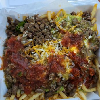 El Super Taco - Carne asade fries with salsas slathered on top - I added the salsas on top of their gorgeous presentation - Mexican Near Me - Colorado Springs, Colorado El Super Taco - Carne asade fries with salsas slathered on top - I added the salsas on top of their gorgeous presentation - Mexican Near Me - Colorado Springs, Colorado