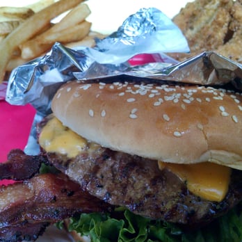 Red Mill Burgers - Bacon Delux with cheese, onion rings, and fries. - Burgers Near Me - Seattle, Washington Red Mill Burgers - Bacon Delux with cheese, onion rings, and fries. - Burgers Near Me - Seattle, Washington