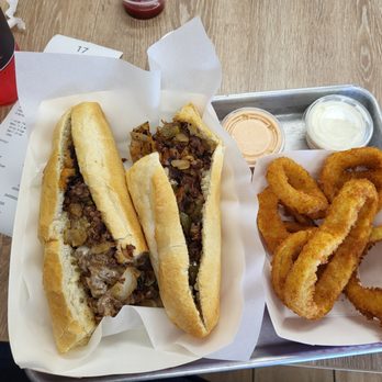 The Steakout - Heist Sandwich (jalapeños, onions, chipotle Ranch sauce). with Onion rings and soda - Cheesesteaks Near Me - Fair Oaks, California The Steakout - Heist Sandwich (jalapeños, onions, chipotle Ranch sauce). with Onion rings and soda - Cheesesteaks Near Me - Fair Oaks, California