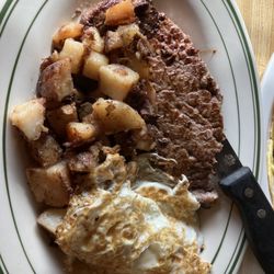 The Corner Deli - Steak and Eggs . Over medium with medium sirloin.