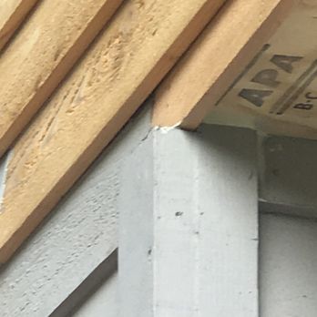 L J Level Construction - Large portions of the job left unpainted and uncovered for months, hard to see from picture but that post sticks out 2-3 inches - General Contractors Near Me - Isanti, Minnesota