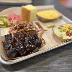 Porky Butts BBQ - Burnt Ends, pulled pork, loaded grits, Mac and cheese.