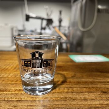 Firefly Distillery - a shot glass on a table - Distilleries Near Me - North Charleston, South Carolina