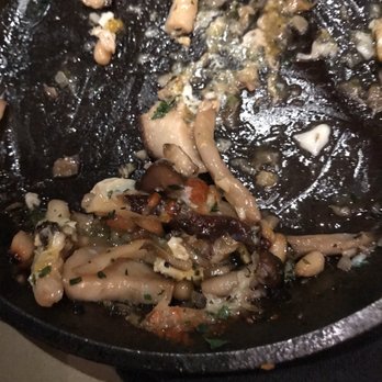 Grill At Amangani - What's left of the mushroom appetizer....had to stop myself and everyone to take the pic....before it would be all gone. - New American Near Me - Jackson, Wyoming