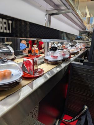 Kura Revolving Sushi Bar by null