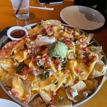 BJ's Restaurant & Brewhouse - Loaded Nachos with Chicken (Appetizer) - New American Near Me - Tuttle, Ohio BJ's Restaurant & Brewhouse - Loaded Nachos with Chicken (Appetizer) - New American Near Me - Tuttle, Ohio