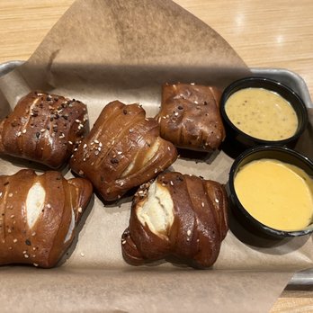 Buffalo Wild Wings - Pretzel bites. Served with a cheese & a mustard sauce - Sports Bars Near Me - Kaneohe, Hawaii