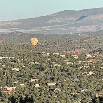 Sky Ranch Lodge - View of hot air balloon early morning from deck of our room - Hotels Near Me - Sedona, Arizona Sky Ranch Lodge - View of hot air balloon early morning from deck of our room - Hotels Near Me - Sedona, Arizona