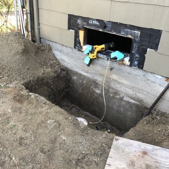 Economy Concrete Cutting Service - a hole in the ground - General Contractors Near Me