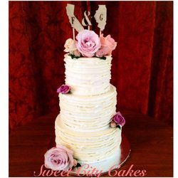 Sweet City Cakes - Small 3 tier textured buttercream covered wedding cake with fresh flowers