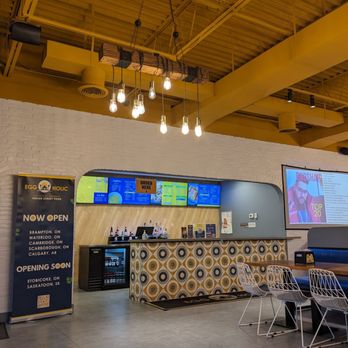 Eggholic - a restaurant with tables and chairs - Halal Near Me - Brampton, Ontario Eggholic - a restaurant with tables and chairs - Halal Near Me - Brampton, Ontario