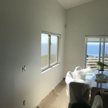 RCA Painting & Home Maintenance - a living room with a view of the ocean - Drywall Installation & Repair Near Me - Oxnard, California RCA Painting & Home Maintenance - a living room with a view of the ocean - Drywall Installation & Repair Near Me - Oxnard, California